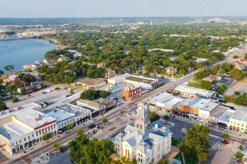 Aerial view of Granbury Town Square and Lake Granbury in Granbury, Texas.