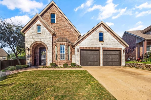 Exterior of 7321 Brightwater Road, a home in the Riverhills neighborhood of Fort Worth, Texas, near the Trinity River and Trinity Trails.